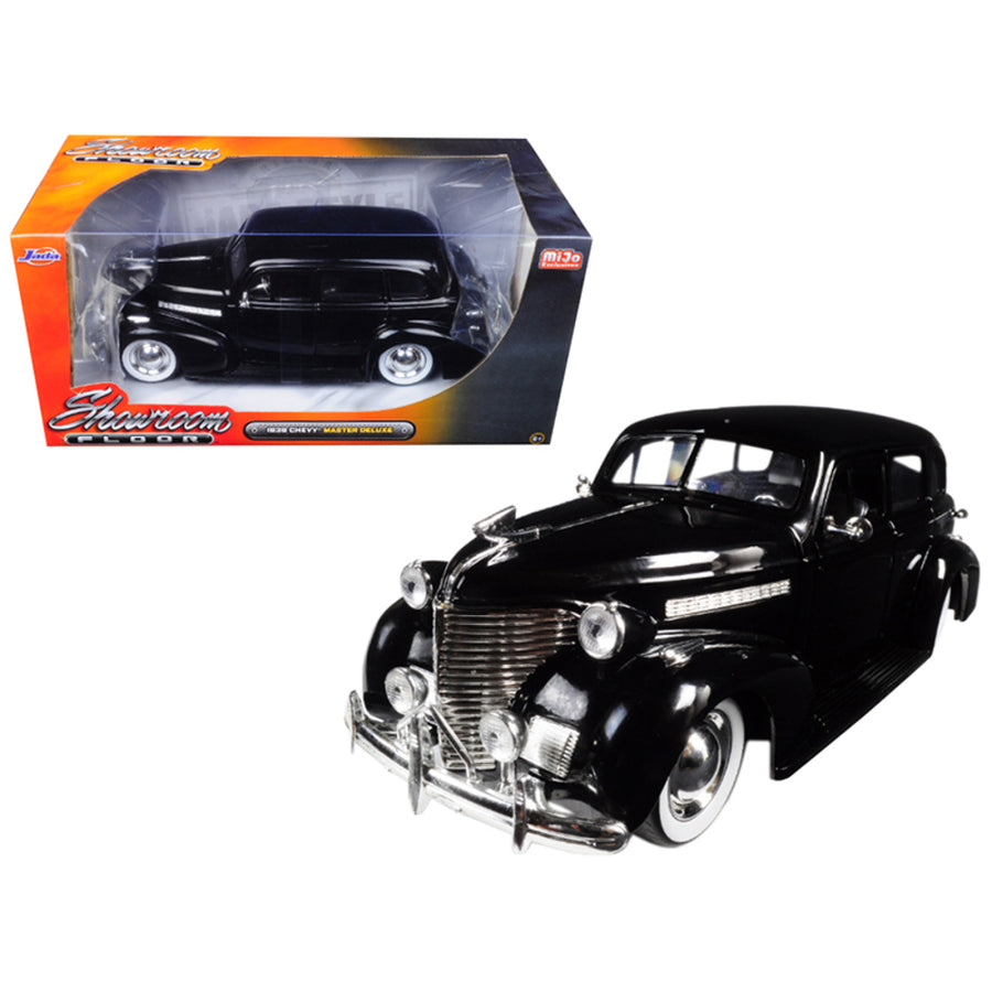 1939 Chevrolet Master Deluxe Black With Baby Moon Wheels Showroom Floor 1/24 Diecast Model Car By Jada 98880