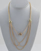 Layered faux pearl chain necklace w/ rhinestone detail