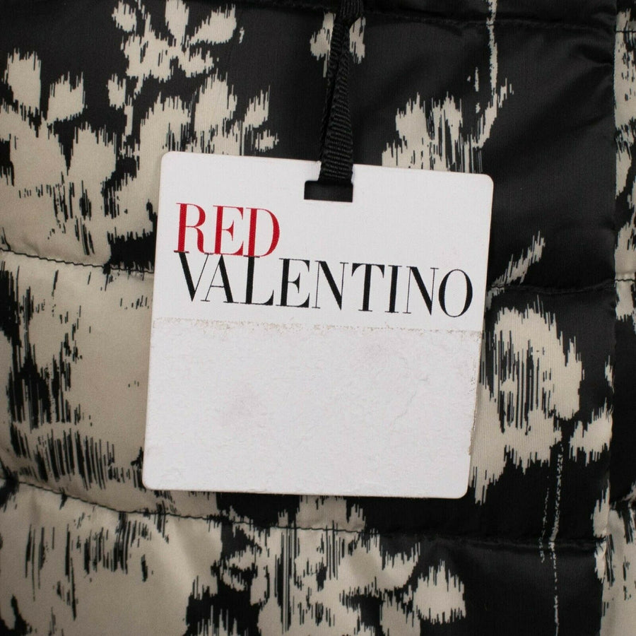 Printed Ruffle Sleeve Puffer Vest - Black